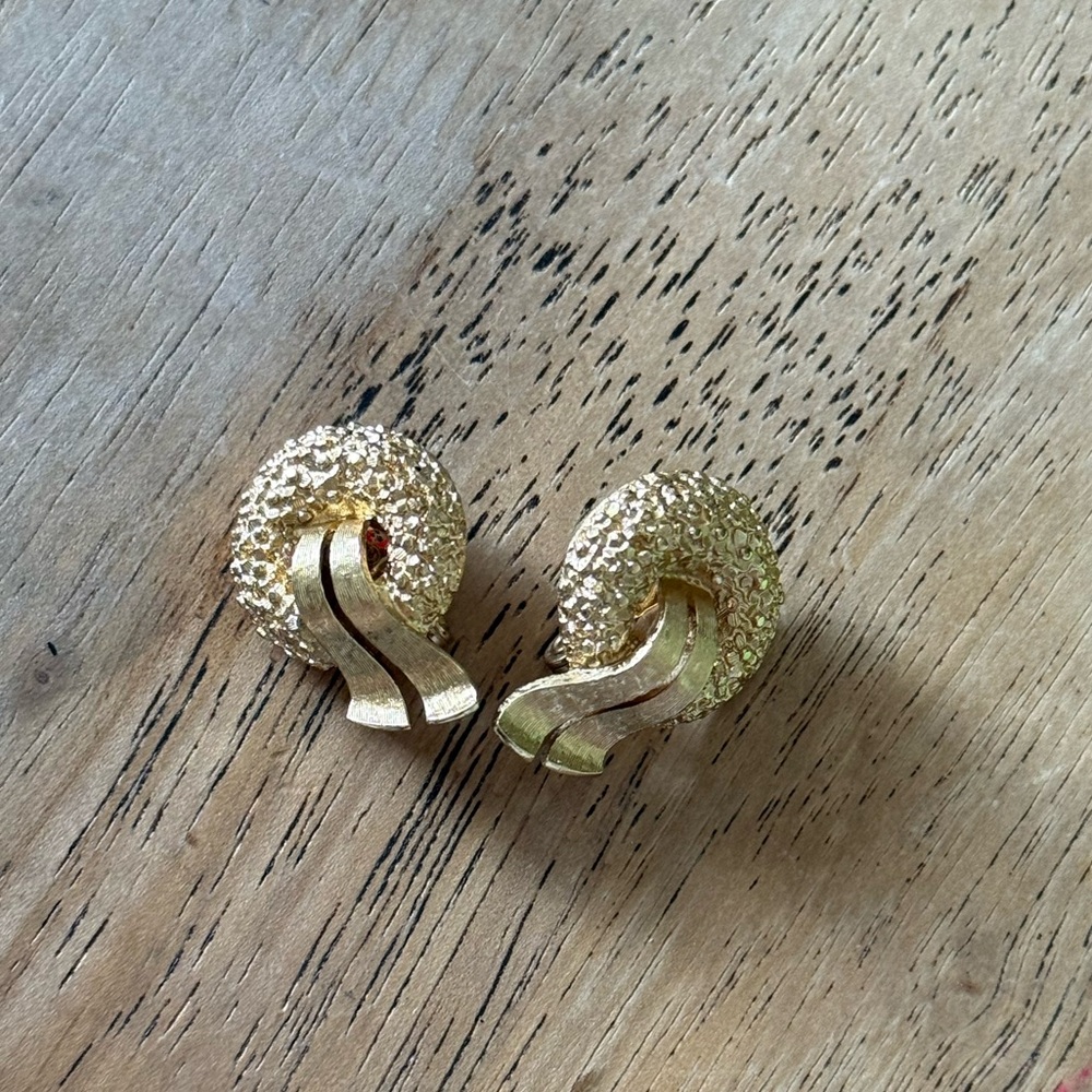 MONET signed vintage gold tone textured designer clip on earrings
